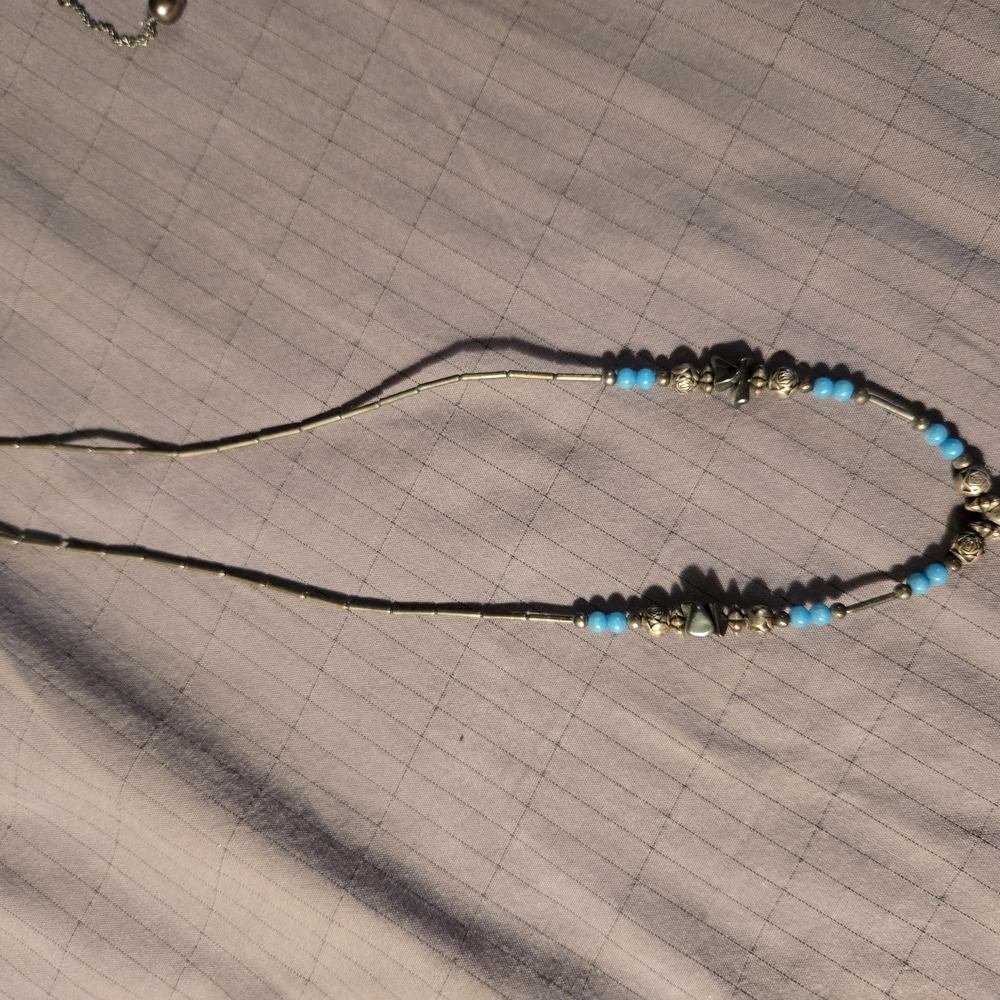 Elegant Beaded Necklace with Blue and Silver Accents